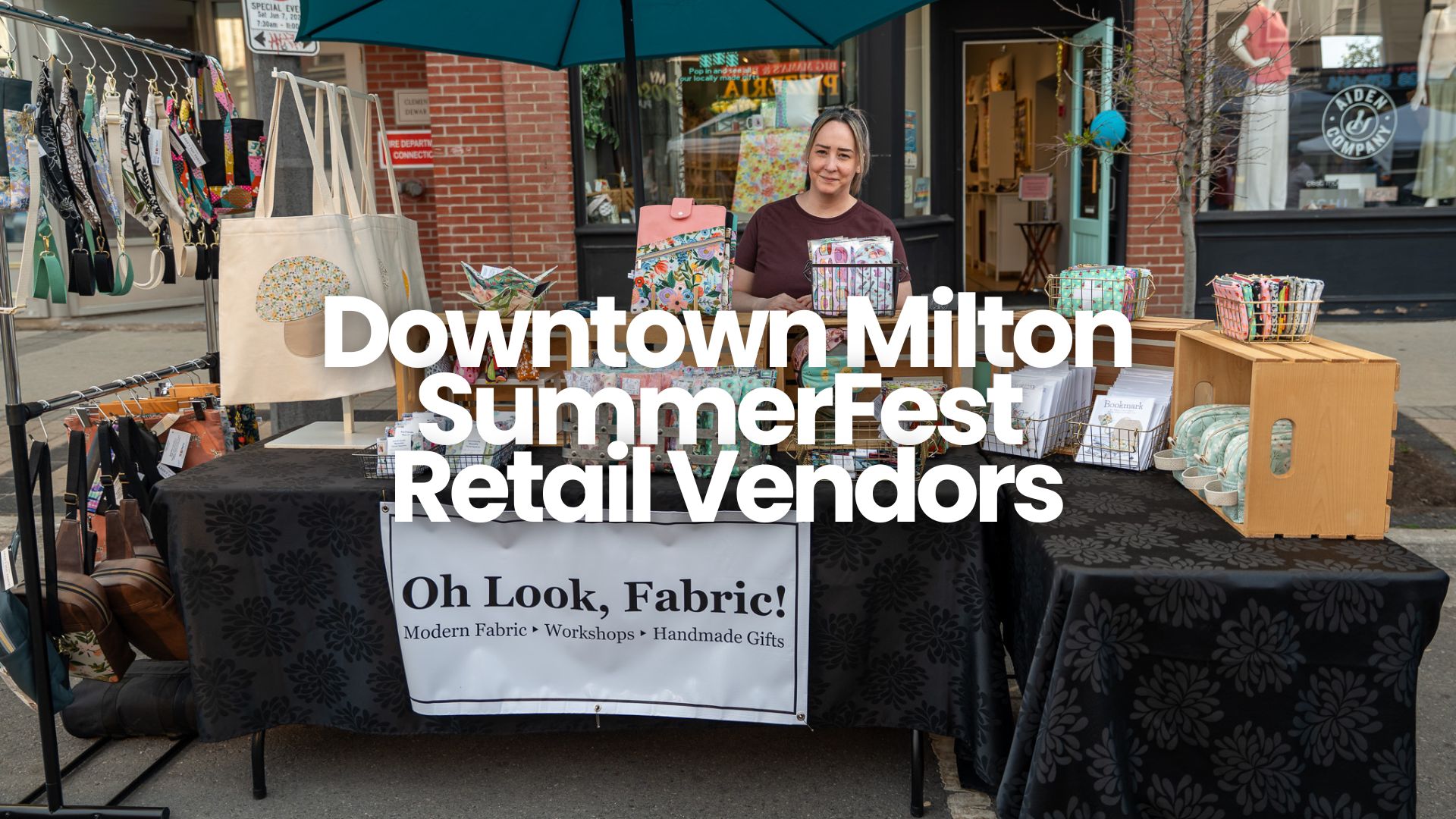 Oh, Look Fabric! displays handmade items at a booth on Main Street. Text overlay reads "Downtown Milton SummerFest Retail Vendors."